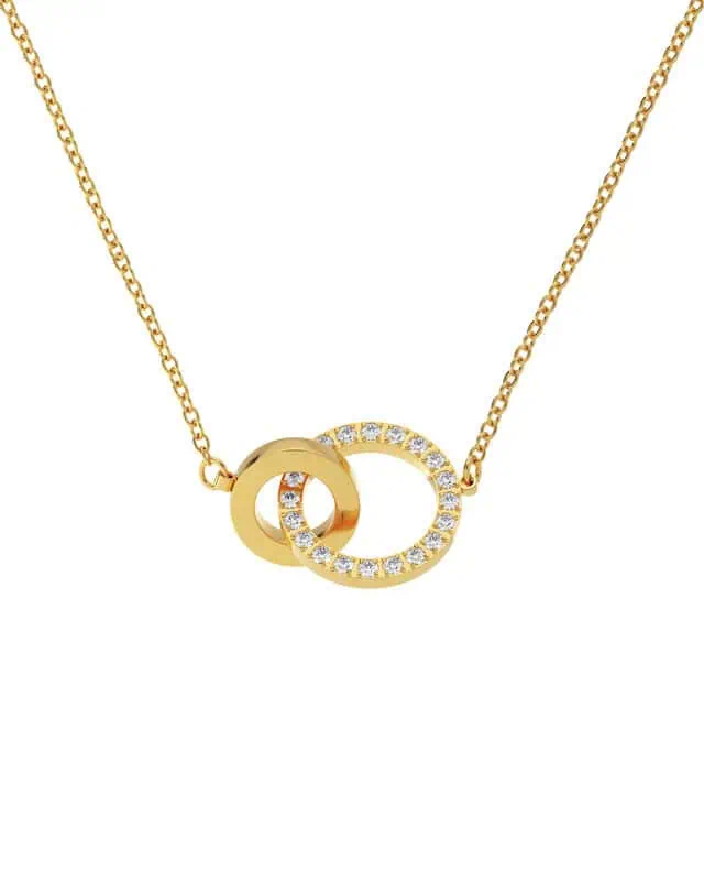 Eternal Orbit halsband i guldpläterat stål med två sammanlänkade cirklar, varav en är dekorerad med cubic zirconia.