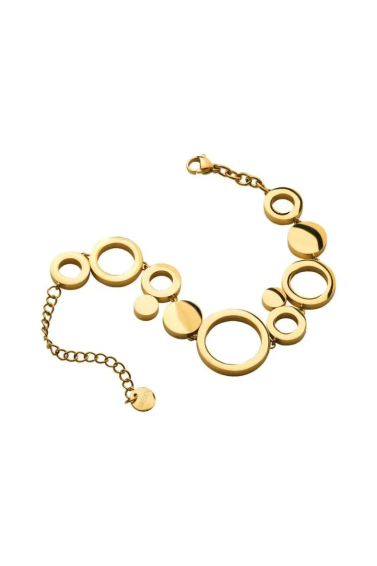 Armband i guldpläterat stål med blanka cirklar i olika storlekar, justerbar kedja och rund bricka med Sägens logotyp.