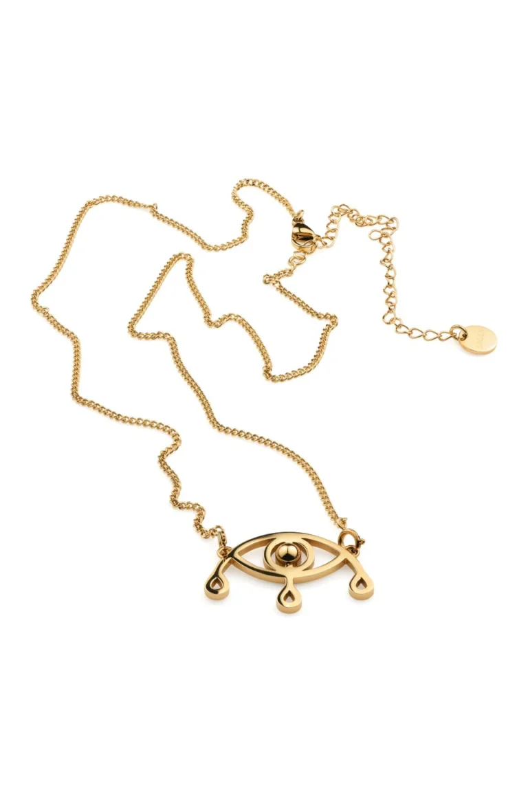 Voyance halsband i guld med öga och tre tårar i hängande design, liggande mot vit bakgrund.