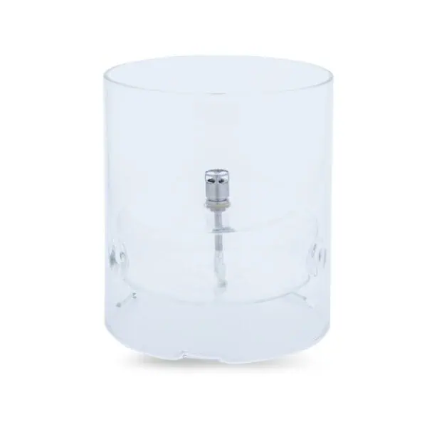 Transparent cylindrisk oljelampa i glas med kromfärgad brännare, mot vit bakgrund.