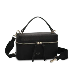 Lycke Sandnes – Svart elegans i kompakt format