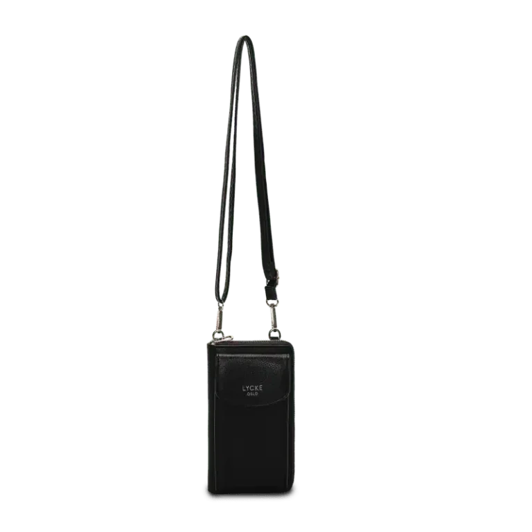 Svart phonebag från Lycke Oslo med lång axelrem och smalt, kompakt format för mobil och små tillhörigheter.